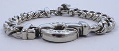 Agatha Paris Bracelet chaîne à maillons courbes de couleur argent avec médaillon