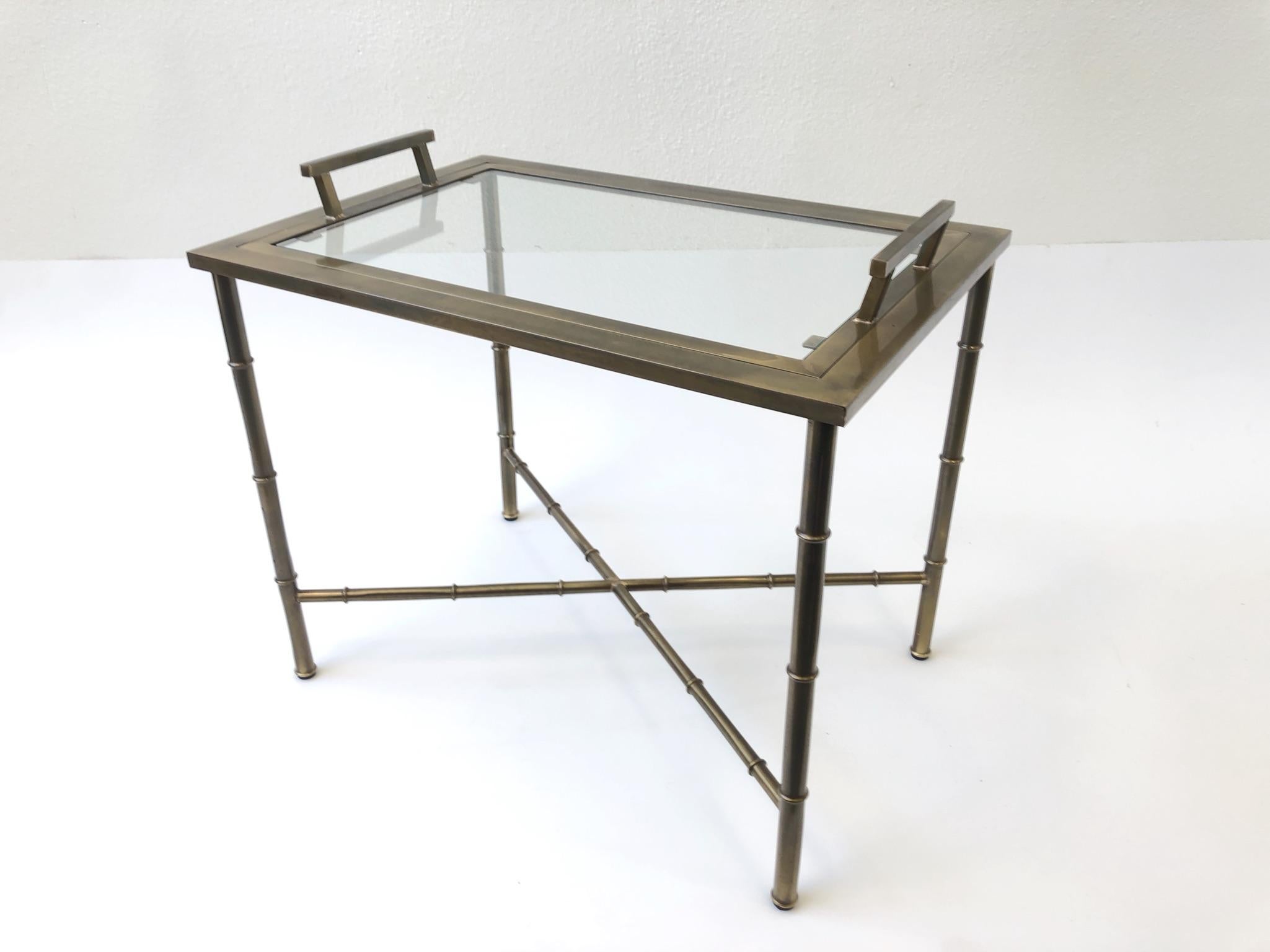 Late 20th Century Aged Brass and Glass Faux Bamboo Tray Table by Mastercraft