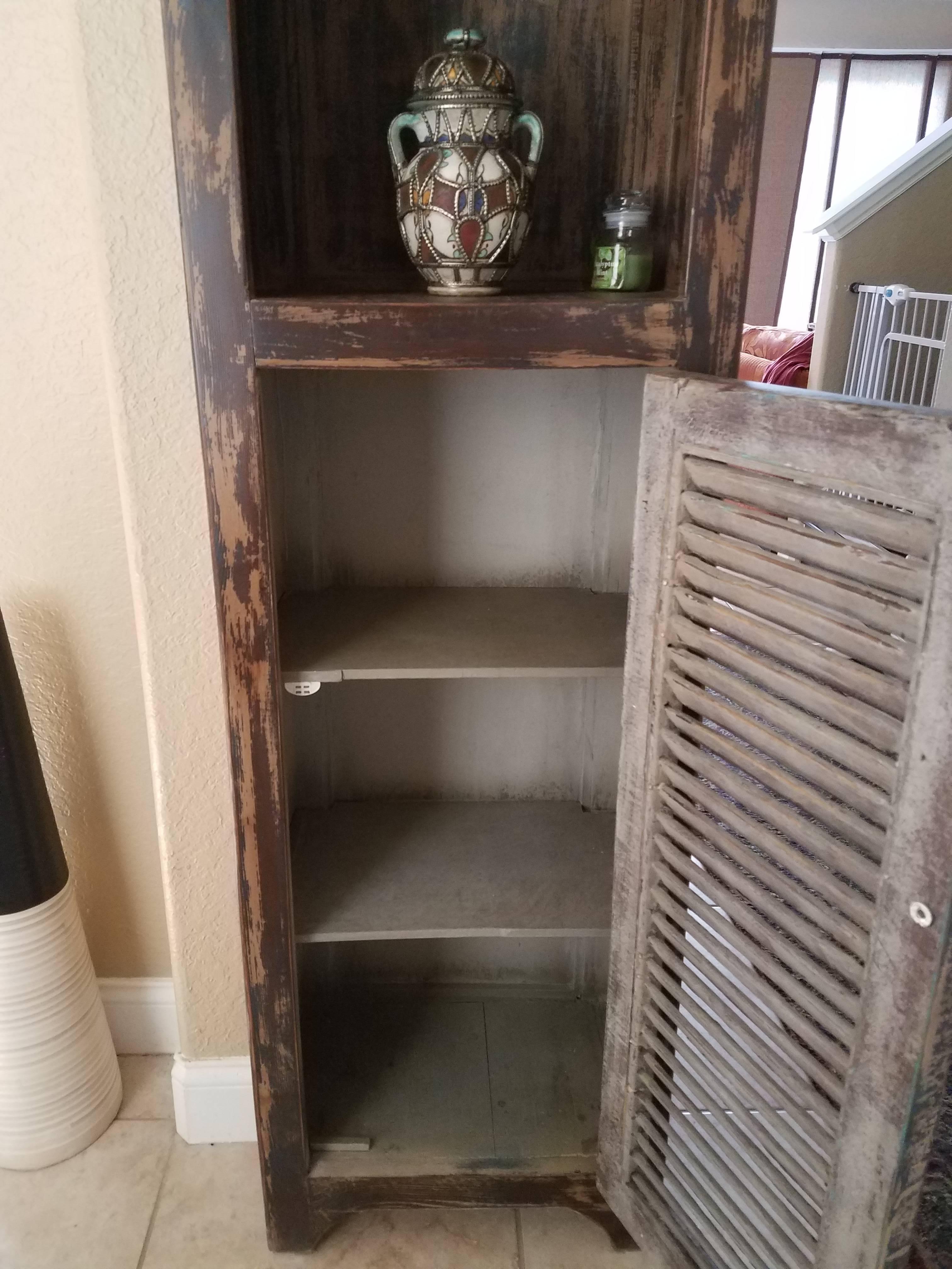 Aged Brown Moroccan Carved Cabinet, Old Window Shutter In Excellent Condition For Sale In Orlando, FL