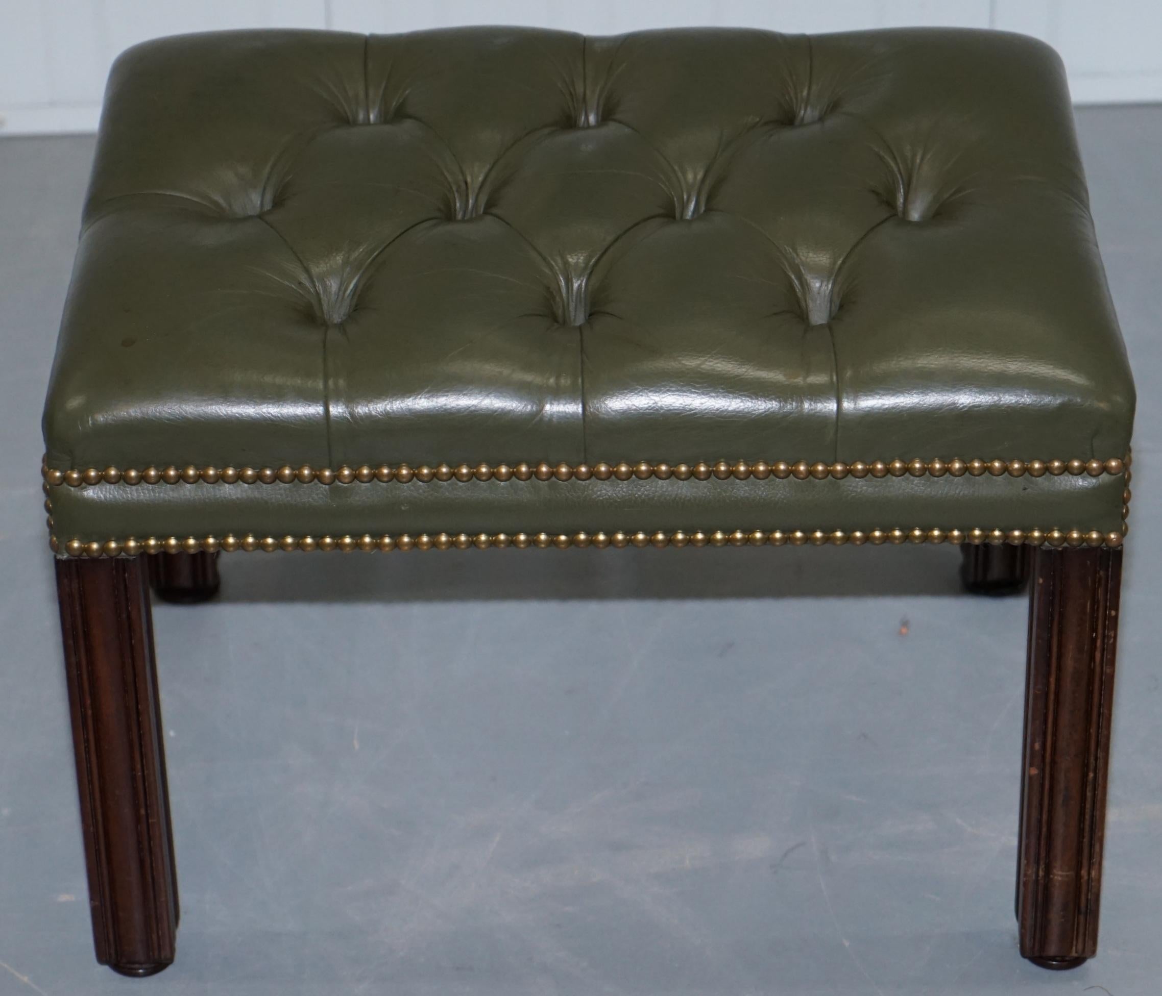 We are delighted to offer for sale this lovely aged green leather Vintage Chesterfield footstool

We have deep cleaned hand condition waxed and hand polished the leather and wood frame from top to bottom, it has a lovely vintage look and feels to