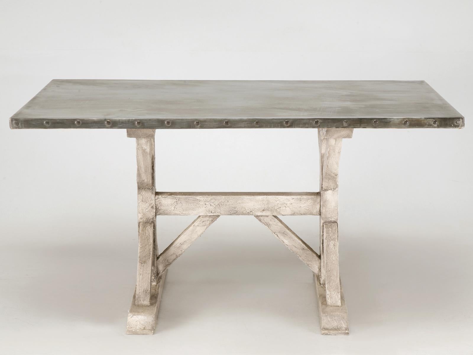 Newly constructed in our own workshop, is a handmade zinc top kitchen or dining table on trestle base with a distressed painted finish in any color or size. This kitchen or dining room zinc table is strong extremely stable and ideal for casual
