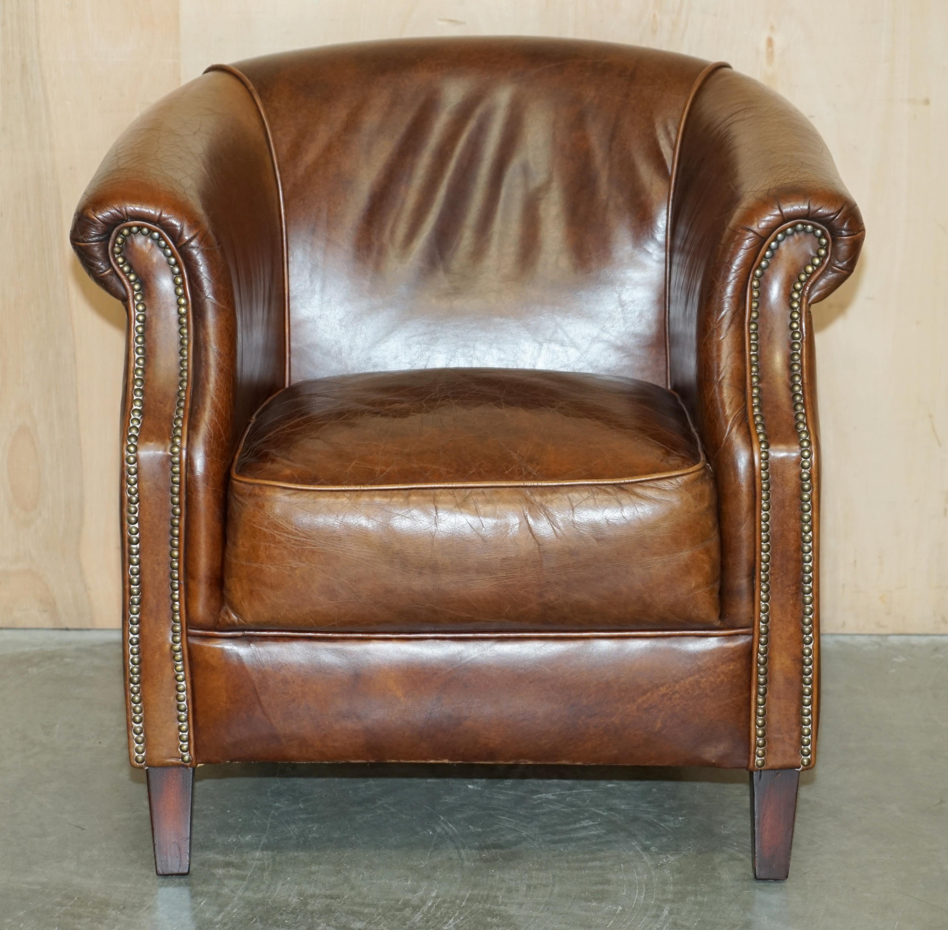 Royal House Antiques

Royal House Antiques is delighted to offer for sale this super comfortable, aged heritage brown leather tub club armchair 

Please note the delivery fee listed is just a guide, it covers within the M25 only for the UK and local