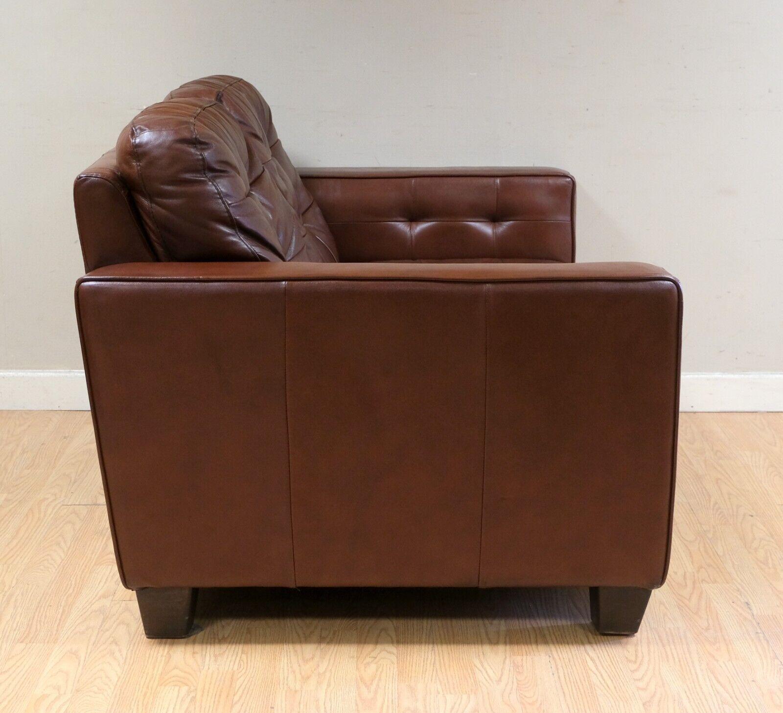 We are delighted to offer for sale this lovely Knoll style brown leather two seater sofa chesterfield style buttoning. 

This piece is good looking and super comfortable, everything compliments with the soft leather. The Knoll style makes it very