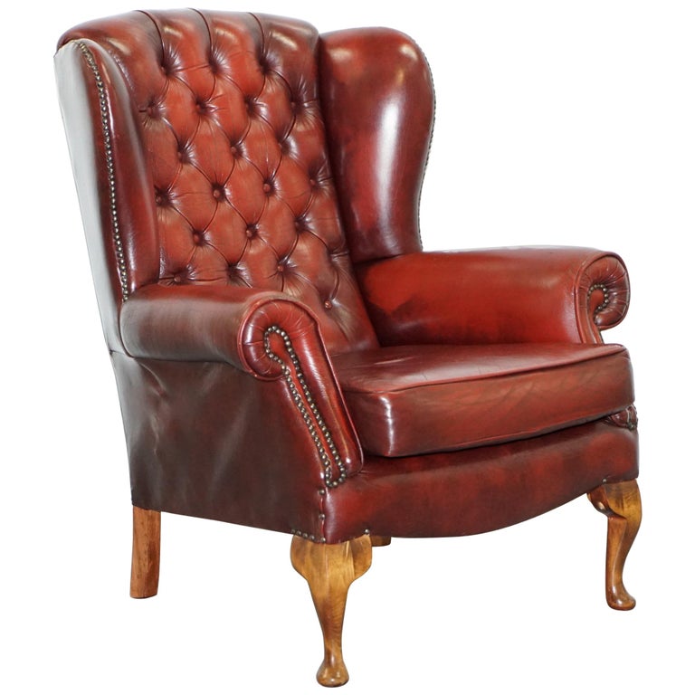 Aged Oxblood Leather Chesterfield Wingback Armchair Cushion Base