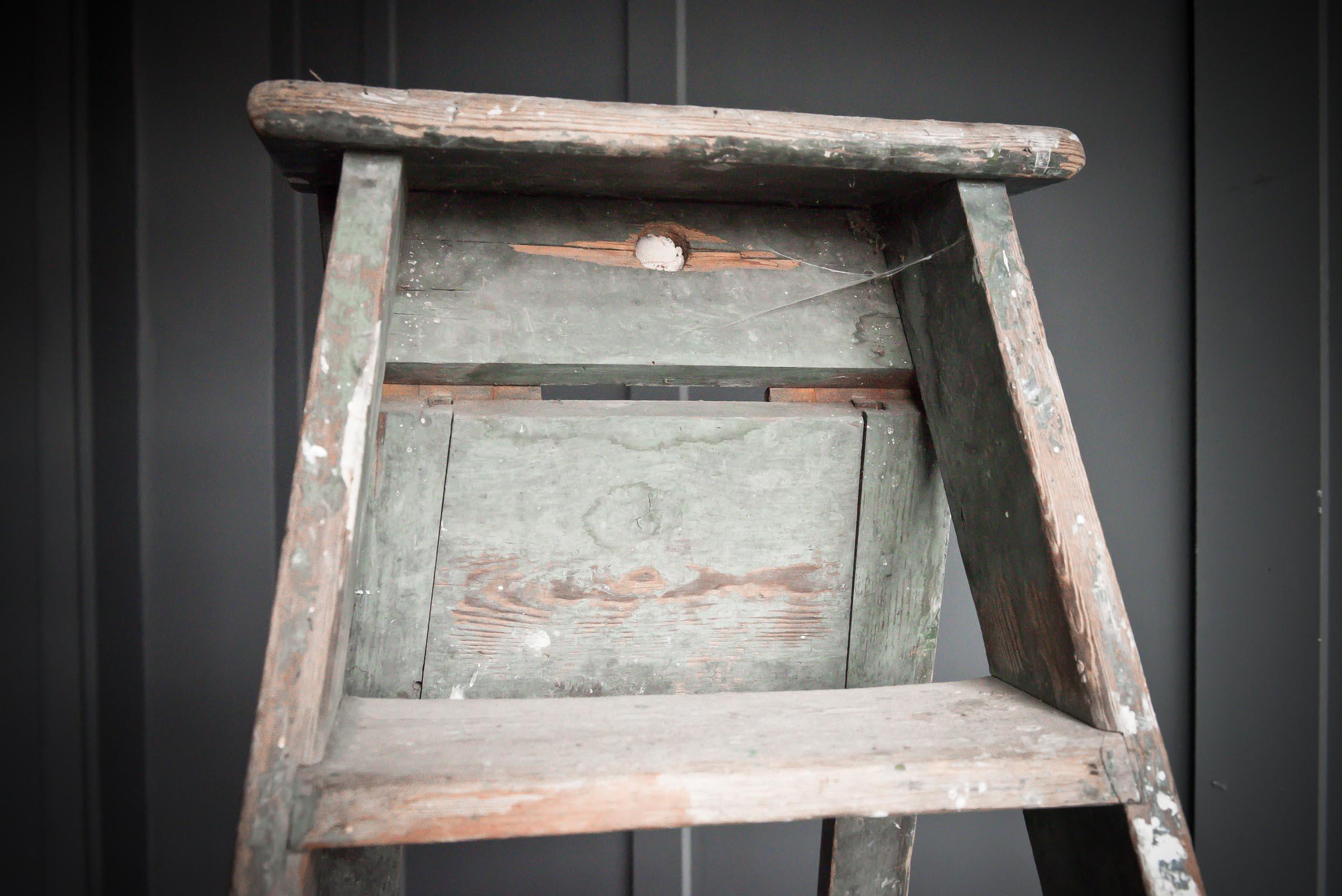 Painters stepladder with a natural aged patina.
