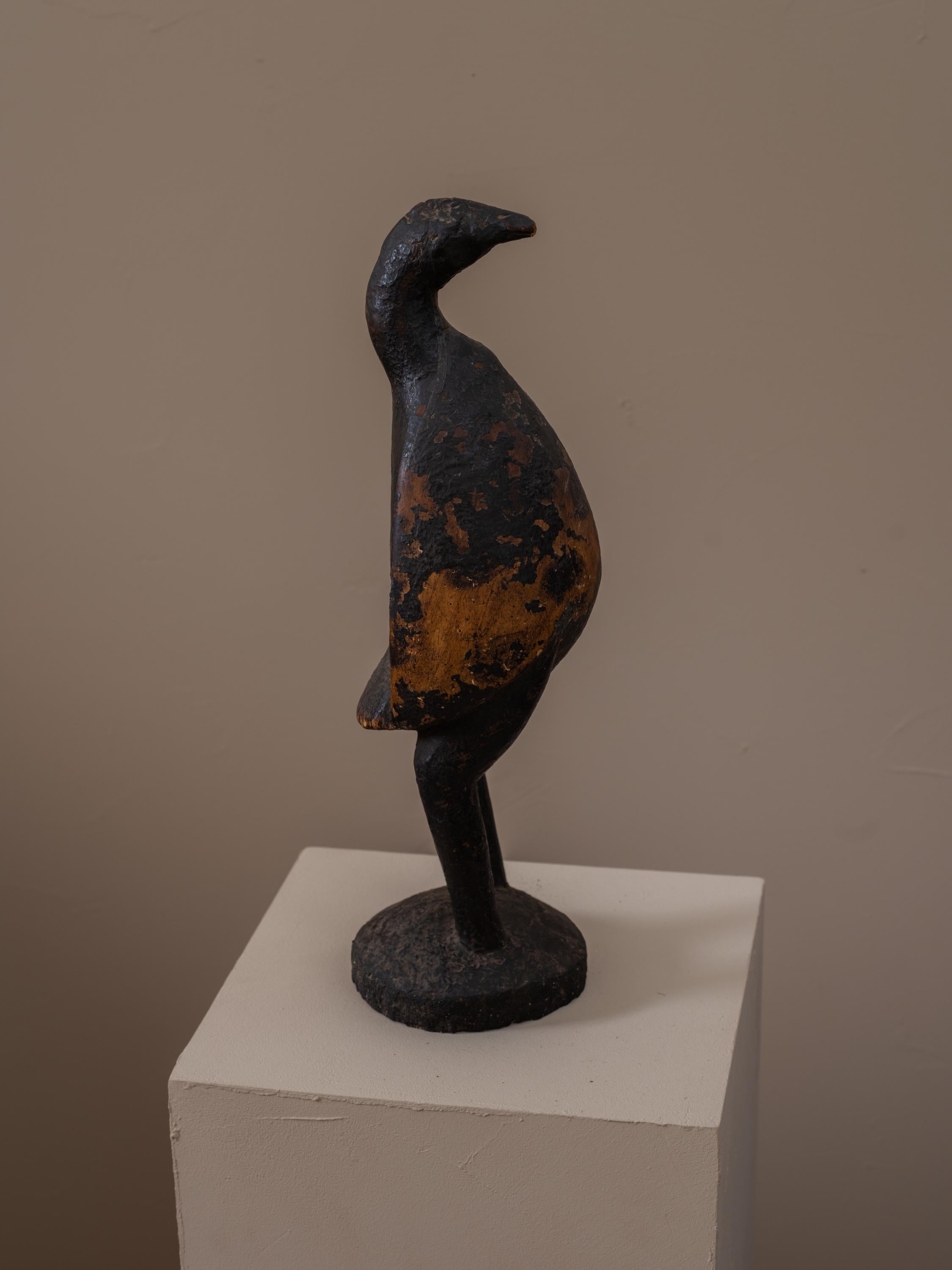 Intagliato a mano Scultura di uccello tuareg invecchiato intagliato a mano in vendita