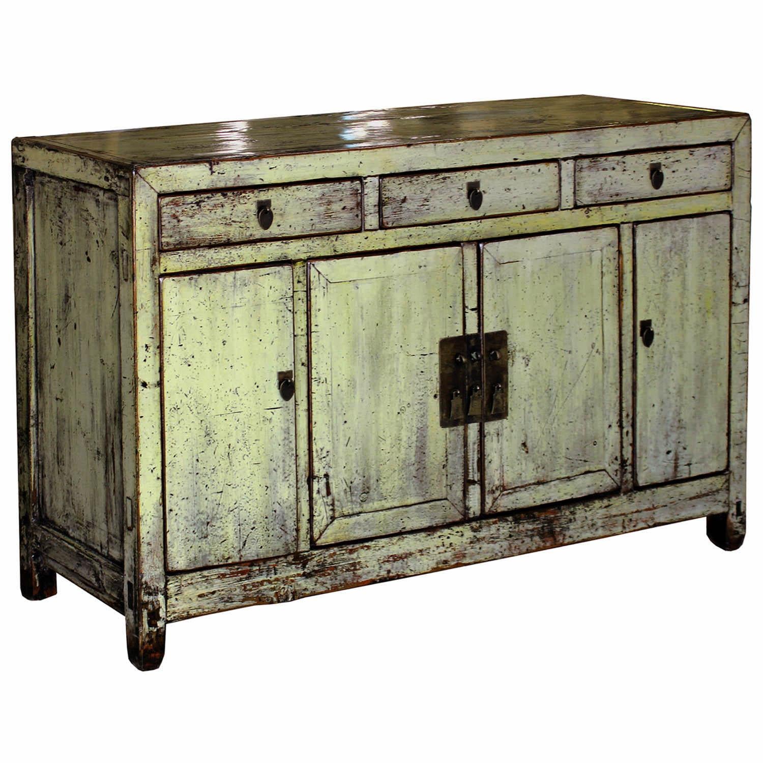 Three drawer sideboard with exposed wood edges, clean lines and ample storage can be used as a server in the dining room or in a contemporary entry way with accessories on top. New interior shelf and hardware. Dongbei, China, circa 1900.