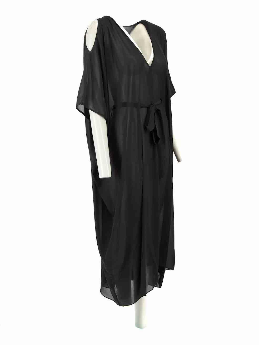 CONDITION is Very good. Hardly any visible wear to kaftan is evident on this used L'Agent by Agent Provocateur designer resale item.
 
Details 
Black 
Polyester 
Kaftan 
Sheer 
V-neck 
Shoulder cut outs 
Waist tie detail
 
Made in China
