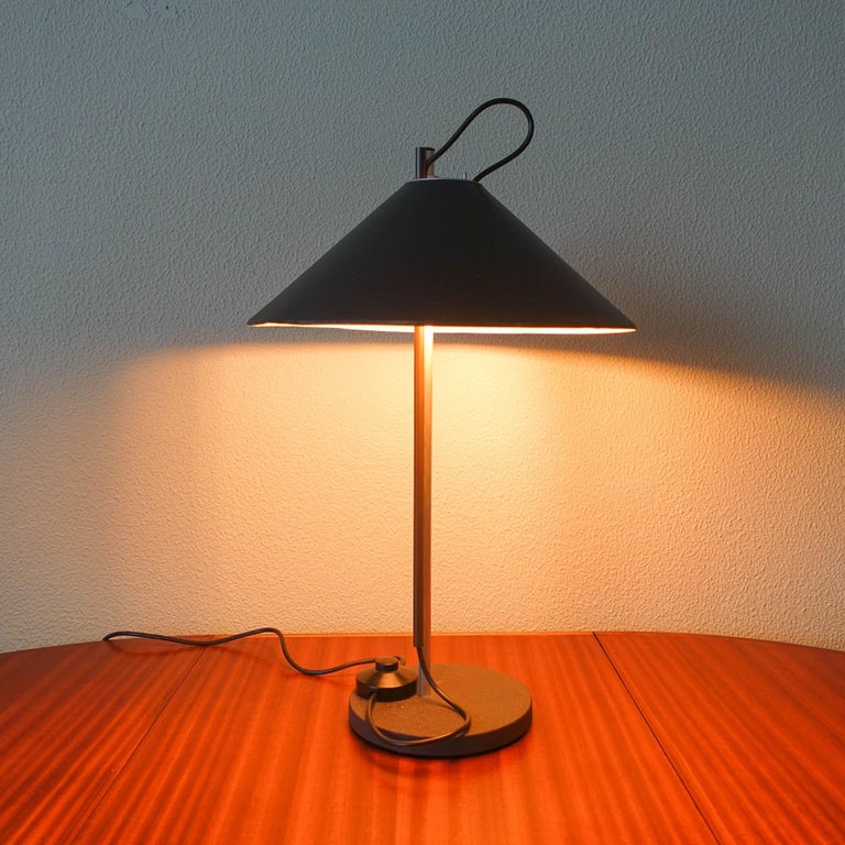 The Aggregato table lamp was  designed by Enzo Mari and Giancarlo Fassina for the Italian manufacturer Artemide, during the 1970's. It is a rare Artemide table lamp, with a small production and is no longer produced.
The construction of this lamp is