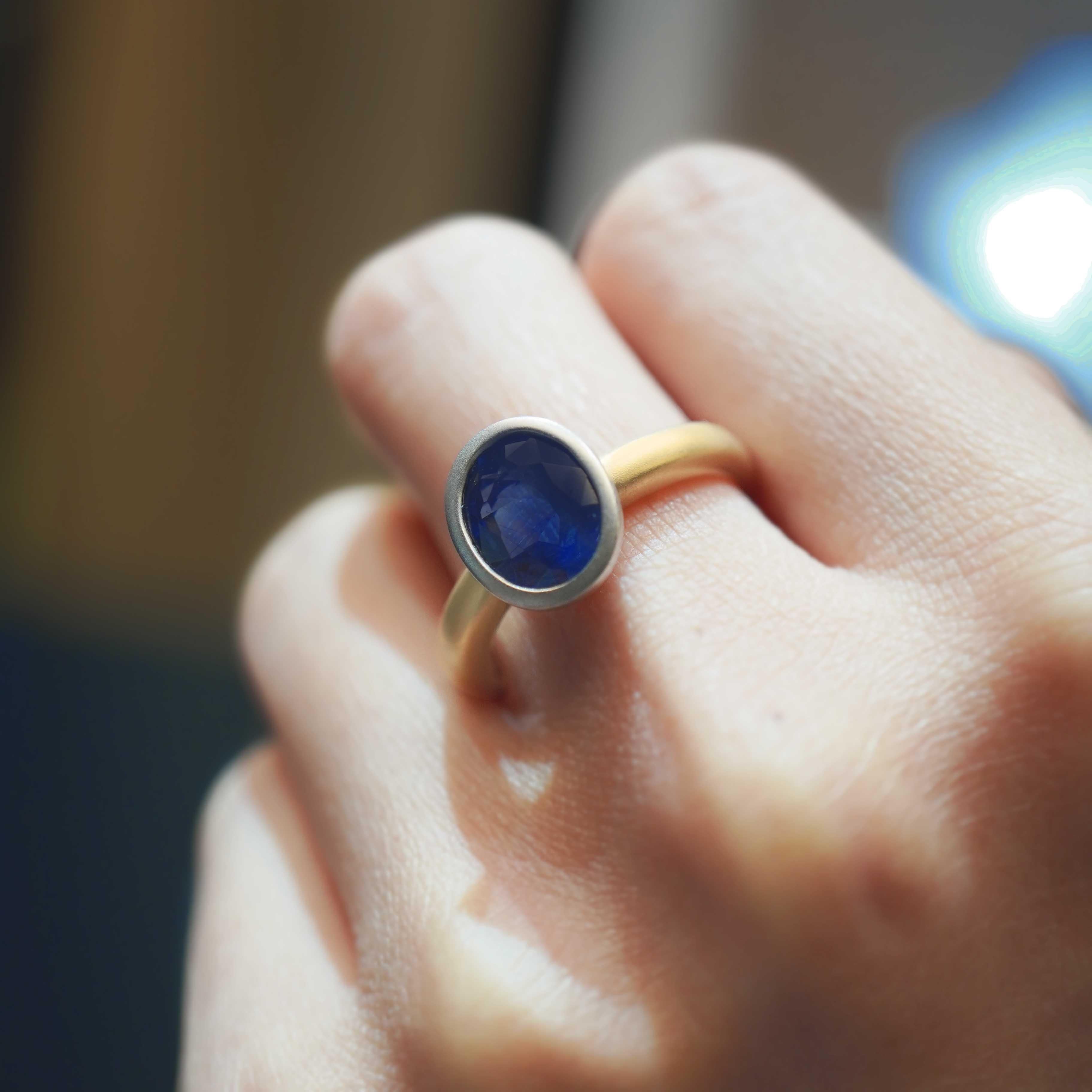 A 2.23 carat vivid blue sapphire is set in Italian matt finish 18K gold ring. The ring is hand made in Hong Kong and the total gram weight is 6.70 grams. The best color for a natural blue sapphire is an intense, velvety, deep royal blue. This color