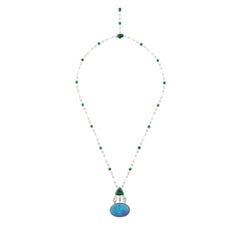 AGL 18.92 Carat Black Opal with 25.94 Carat Tsavorite and Diamonds in Platinum