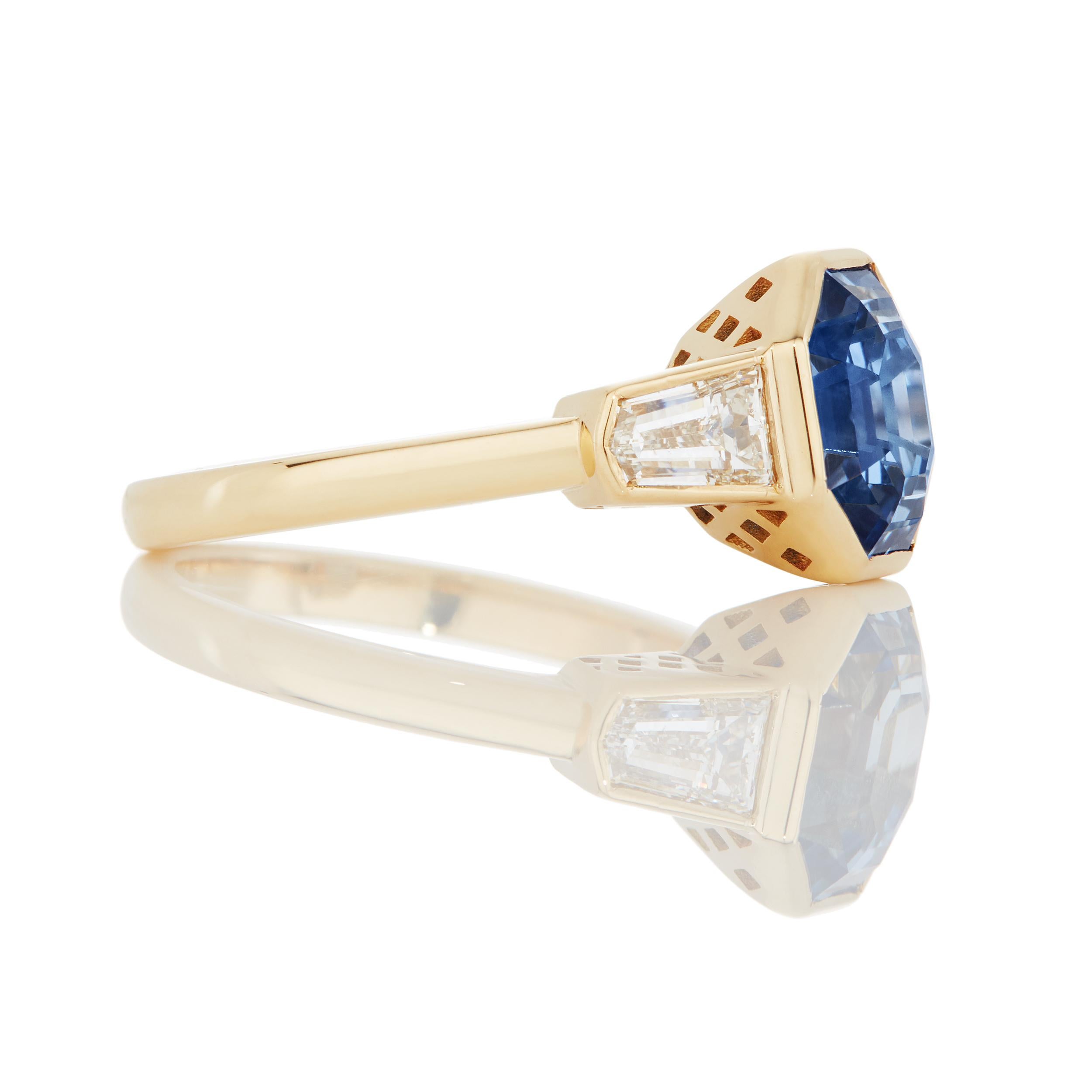 Overall description:

Ring Details
AGL Report # 1102400

     Octagon-Shaped Blue Sapphire weighing ..
Step Cut Profile Diamonds weighing 0.14 carats

Total Gem Weight: 4.21

Ring Size: 5.5

Measurements:
     Length: 24.1 mm
     Weight: 4.8 g
