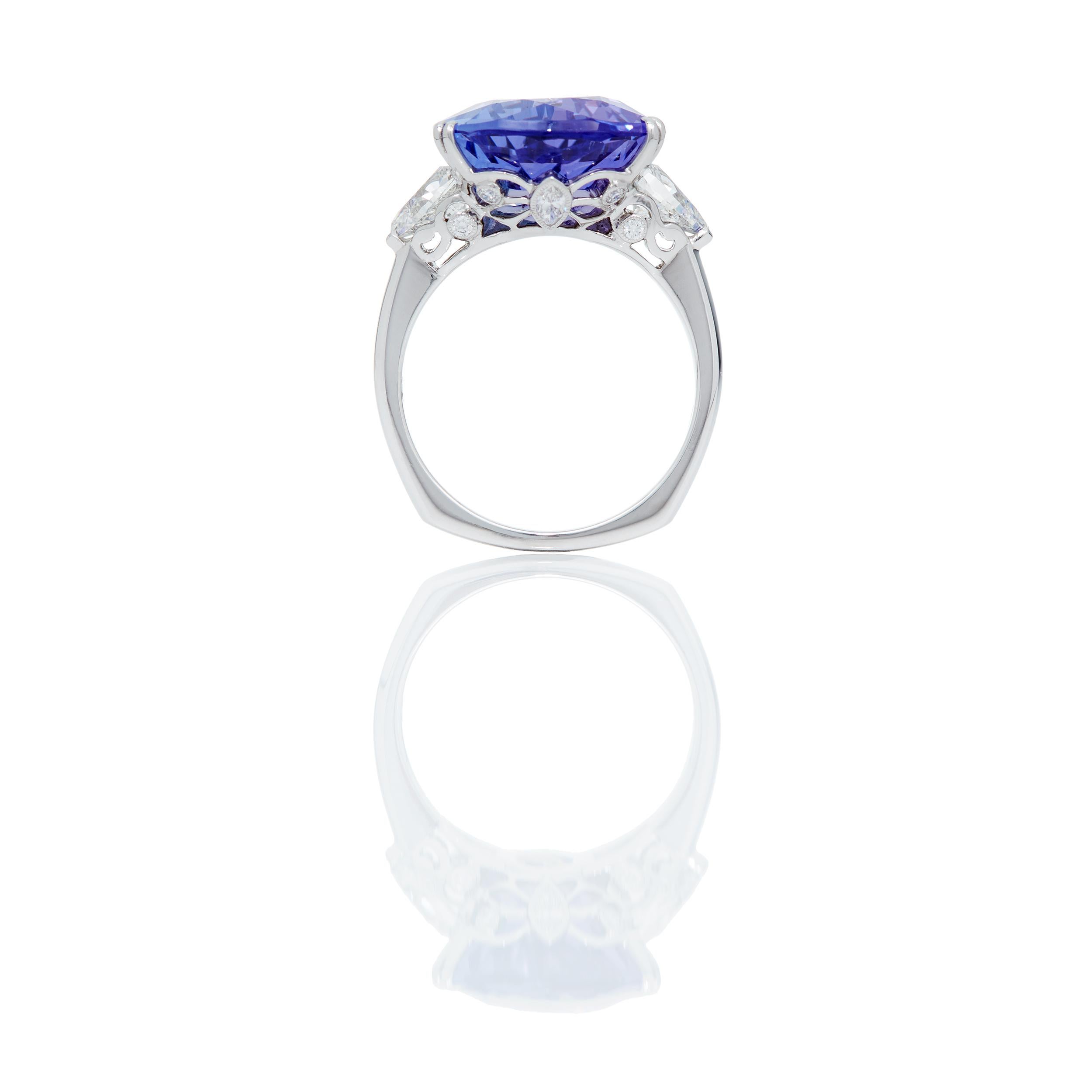 Modern AGL 9.48 Carats Pear Shaped Tanzanite and Diamond Ring in Platinum For Sale