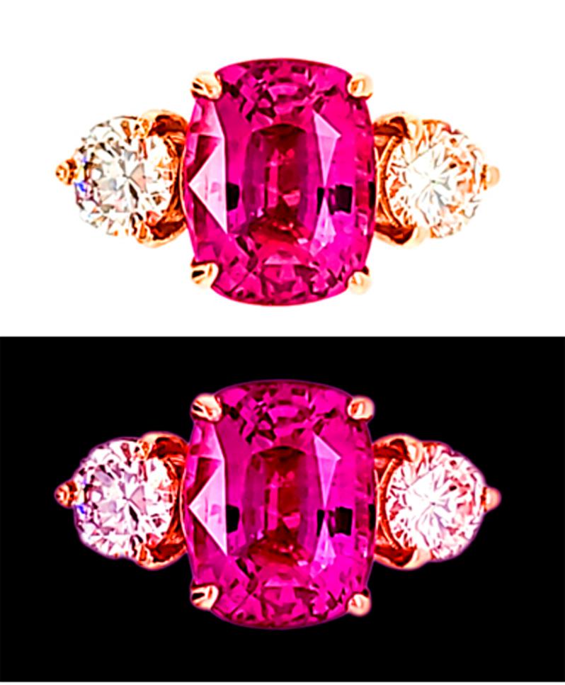 Photos cannot do this Pink Sapphire/Ring Any Justice! The color is a Glowing Magenta Pink and lively, flanked by two Natural Diamonds. The Sapphire is a whopping 5.33cts and is certed by AGL. The Diamonds are SI1/G-H in color and weigh 1ct in total