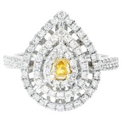 Anello con diamante certificato AGL da 0.08 carati, di colore giallo scuro e purezza VS