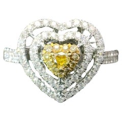 Anello con diamante certificato AGL da 0.098 carati, di colore giallo scuro e purezza VS