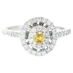 Anello con diamante certificato AGL da 0.098 carati, di colore giallo scuro e purezza VS