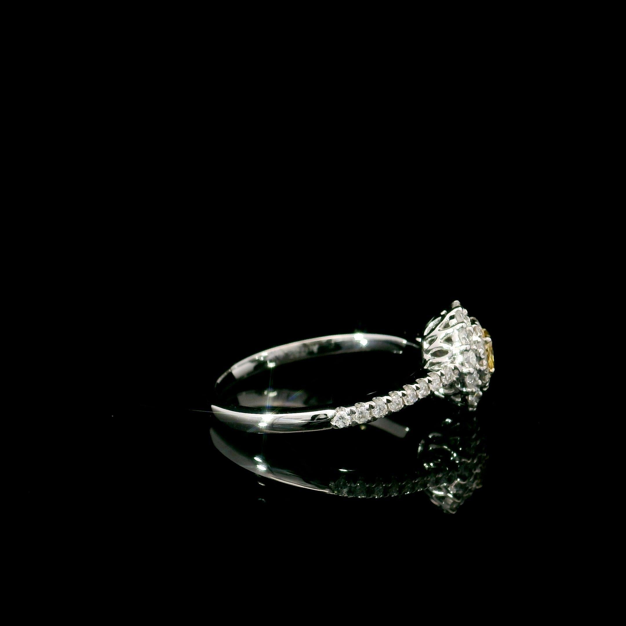 Oval Cut AGL Certified 0.11 Carat Fancy Yellow VS Clarity Diamond Ring For Sale