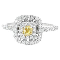Anello con diamante certificato AGL da 0.125 carati, di colore giallo intenso e purezza VS
