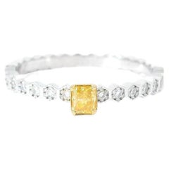 AGL Certified 0.13 Carat Fancy Vivid Yellow VS Clarity Diamond Ring