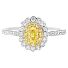 Anello con diamante certificato AGL da 0,137 carati di colore giallo fantasia con purezza SI