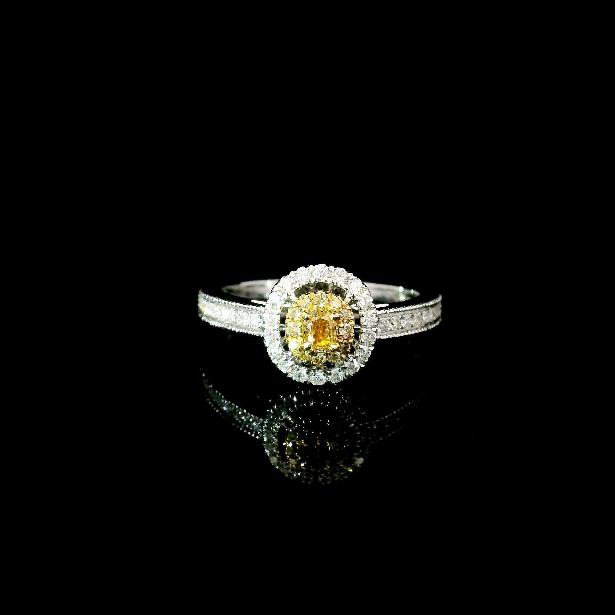 18kt white gold ring with diamonds
  
  Gold colour & karat: White gold 18kt
  Weight: 2.86 grams
  
  Set with-
  Stone type: Diamonds
  Shape: Cushion
  Carat: 0.142 ct
  Colour: Fancy Yellow
  Clarity: VS
  
  Surrounding Stones: Diamonds
 1)