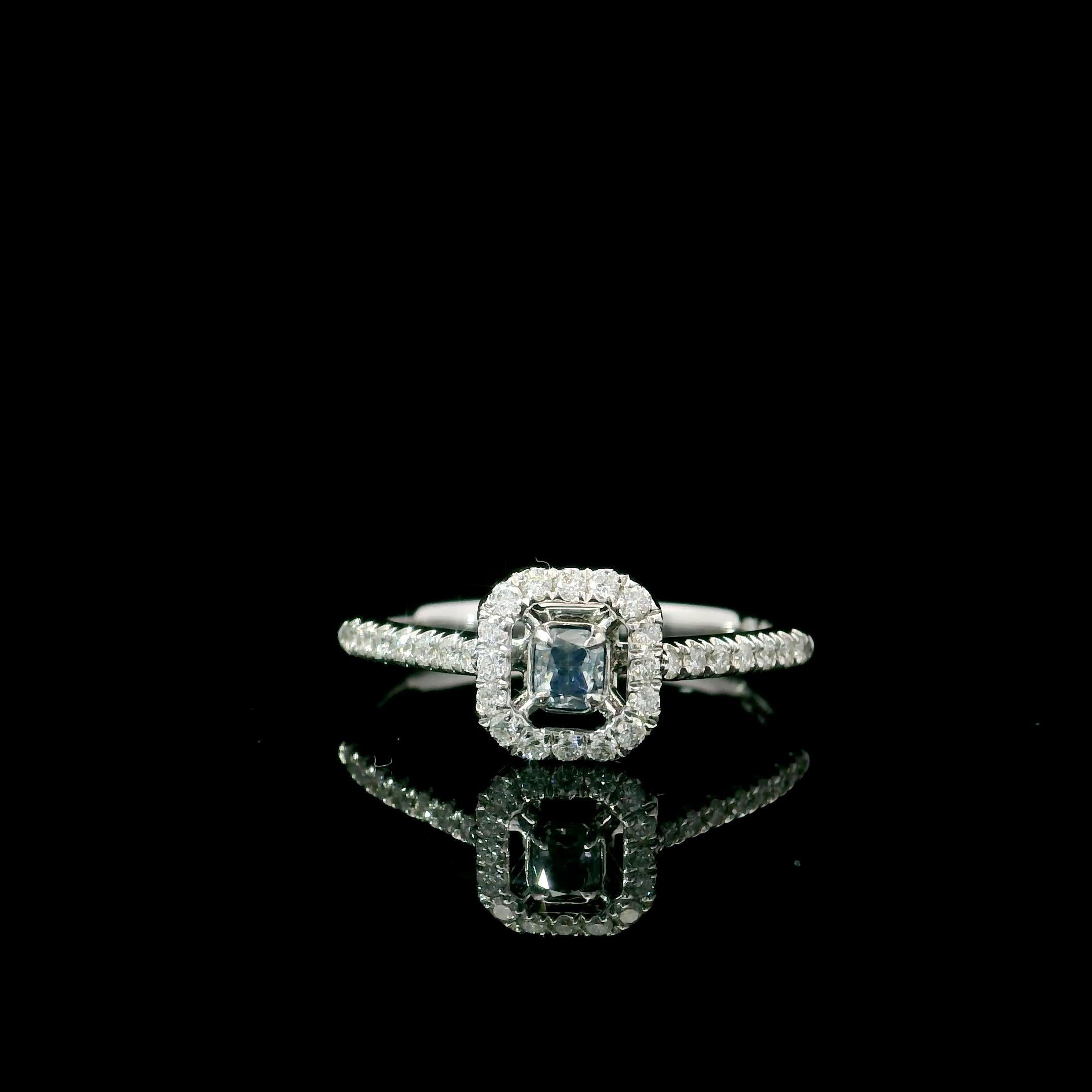 18kt white gold ring with diamonds
  
  Gold colour & Carat: White gold 18kt
  Weight: 2.23 grams
  
  Set with-
  Stone type: Diamonds
  Shape: Cushion
  Carat: 0.146 ct
  Colour: Fancy Blue
  Clarity: SI1
  
  Surrounding Stones: Diamonds
 1)