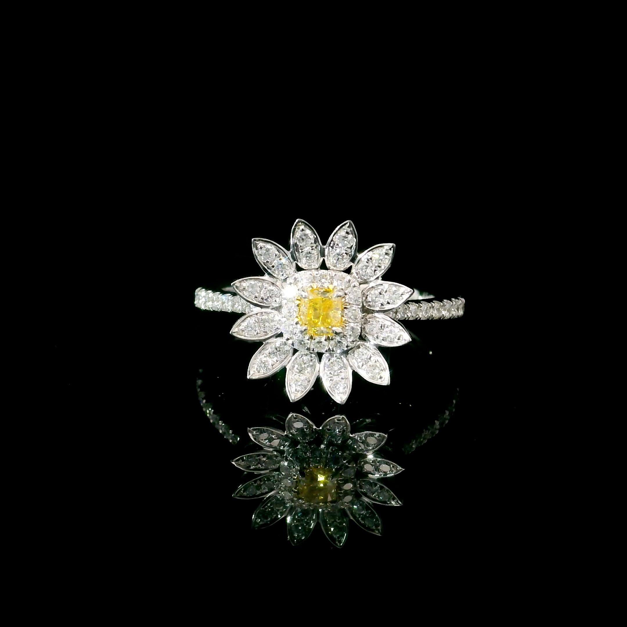 Bague en or blanc 18kt avec diamants
  
  Couleur de l'or et carat : Or blanc 18kt
  Poids : 3.09 grammes
  
  Ensemble avec...
  Type de pierre : Diamants
  Forme : Rond
  Carat : 0,147 ct
  Couleur : Jaune intense fantaisie
  Clarté : VS
  
 