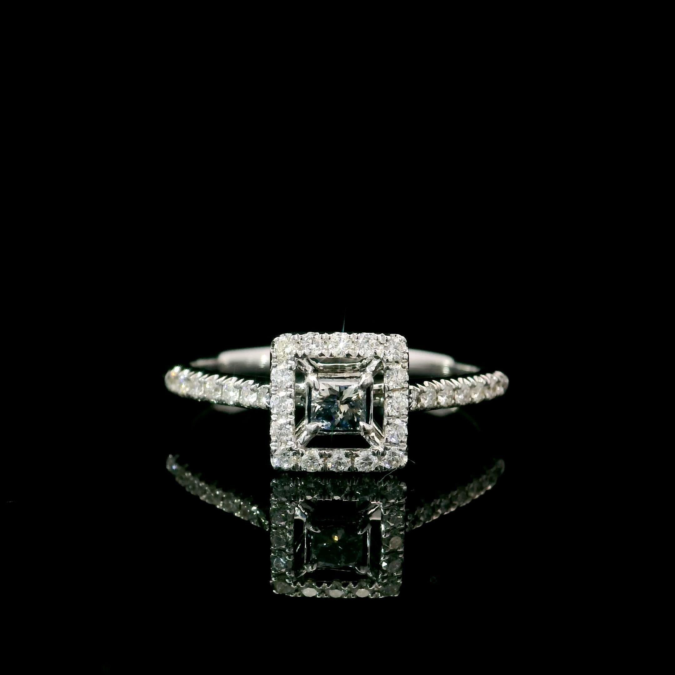 Ring aus 18kt Weißgold mit Diamanten
  
  Goldfarbe & Karat: Weißgold 18kt
  Gewicht: 2.19 Gramm
  
  Satz mit...
  Steinart: Diamanten
  Die Form: Kissen
  Karat: 0,15 ct
  Farbe: Fancy Blau
  Klarheit: VS
  
  Umliegende Steine: Diamanten
 1)