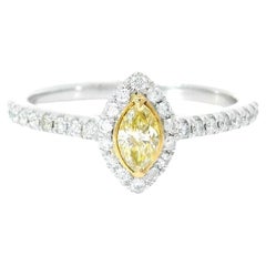 Anillo de diamantes con certificado AGL de 0.168 quilates de color amarillo fantasía y claridad SI