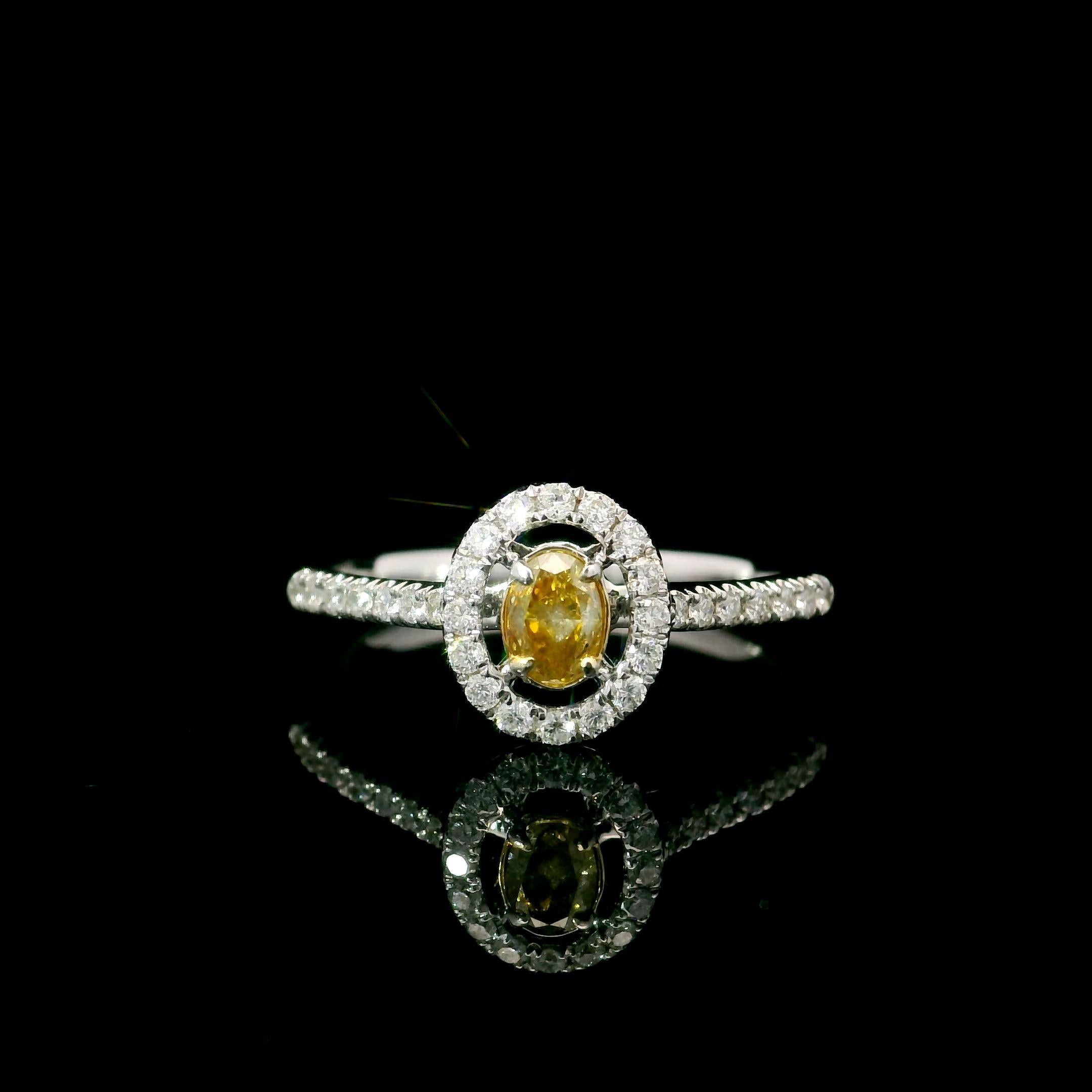 18kt white gold ring with diamonds
  
  Gold colour & Carat: White gold 18kt
  Weight: 2.13 grams
  
  Set with-
  Stone type: Diamonds
  Shape: Oval
  Carat: 0.179 ct
  Colour: Deep Yellow
  Clarity: SI1
  
  Surrounding Stones: Diamonds
 1) White