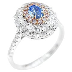 AGL Certified 0.22 CT Blue Diamond 18K White Gold Ring with Diamonds
