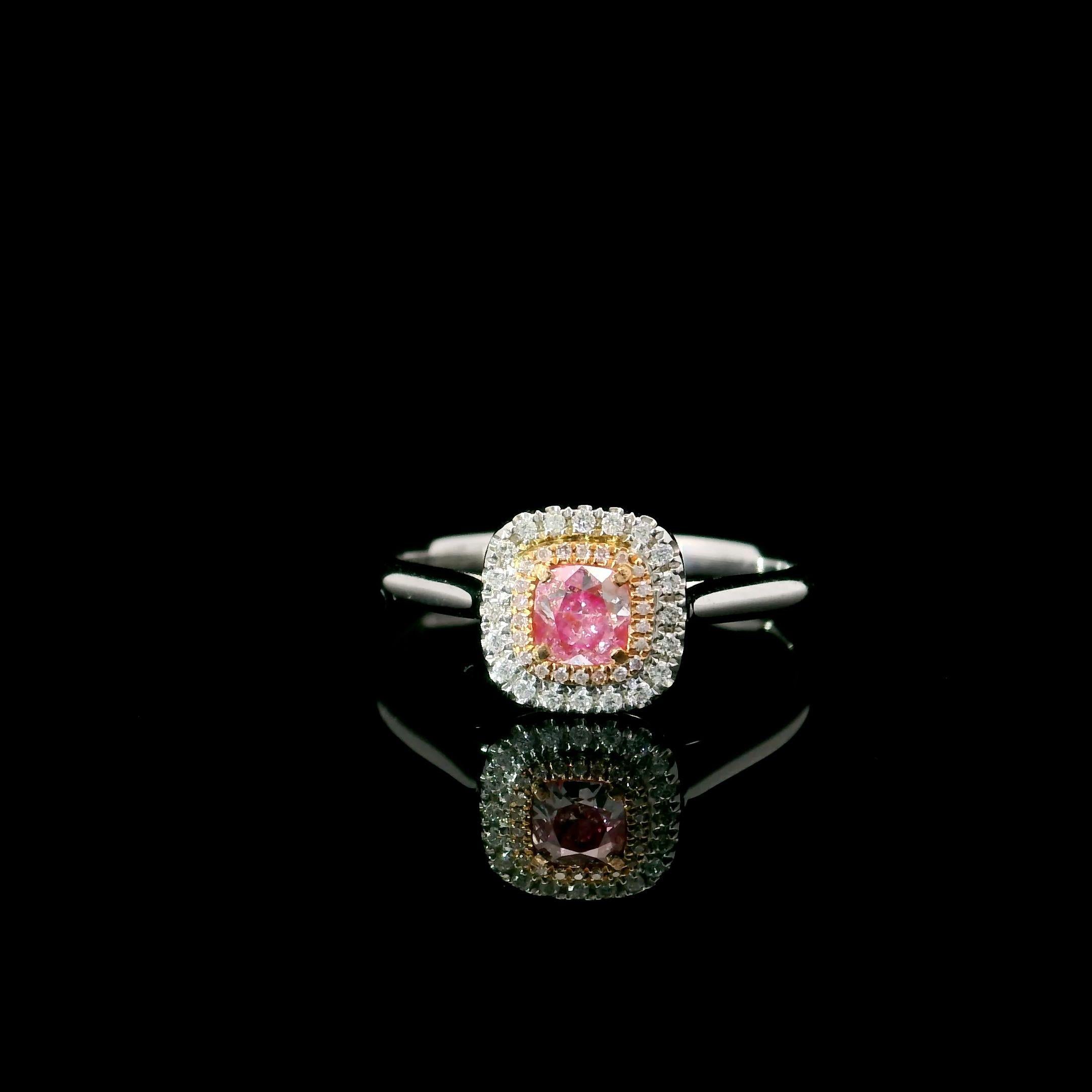 18kt white gold ring with diamonds
  
  Gold colour & Carat: White gold 18kt
  Weight: 2.596 grams
  
  Set with-
  Stone type: Diamonds
  Shape: Cushion
  Carat: 0.25 ct
  Colour: Fancy Pink
  Clarity: VS
  
  Surrounding Stones: Diamonds
 1) Side
