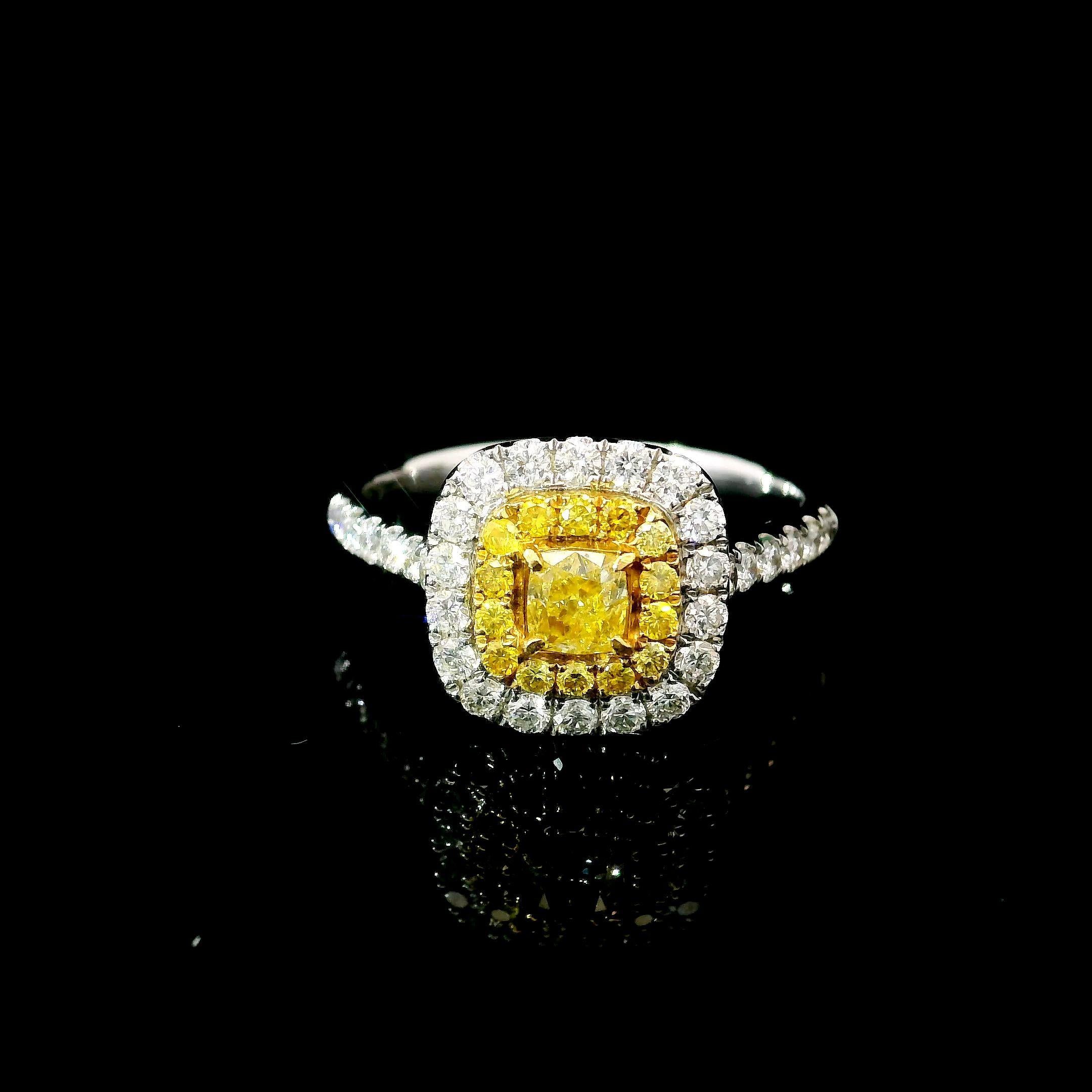 18kt white gold ring with diamonds
  
  Gold colour & karat: White gold 18kt
  Weight: 3.424 grams
  
  Set with-
  Stone type: Diamonds
  Shape: Cushion
  Carat: 0.27 ct
  Colour: Faint Yellow
  Clarity: SI
  
  Surrounding Stones: Diamonds
 1)