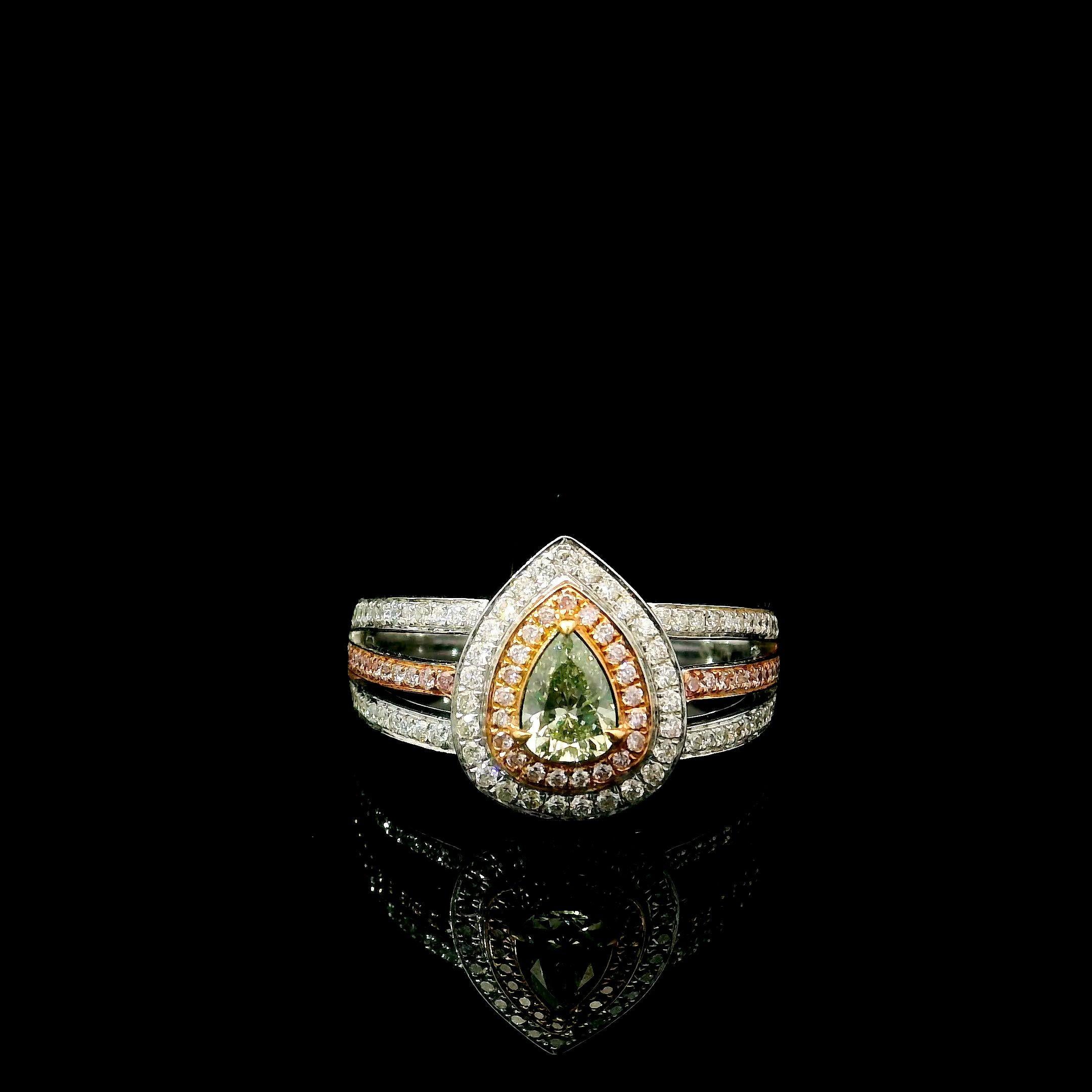 Anello in oro bianco 18 carati con diamanti
  
  Colore e caratura dell'oro: Oro bianco 18kt
  Peso: 5,183 grammi
  
  Imposta con...
  Tipo di pietra: Diamanti
  Forma: A pera
  Carati: 0,30
  Colore: Verde Fantasia
  Chiarezza: VS
  
  Pietre
