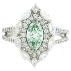 GIA Certified 0.66 Carat Light Yellow Green SI1 Clarity Diamond Ring