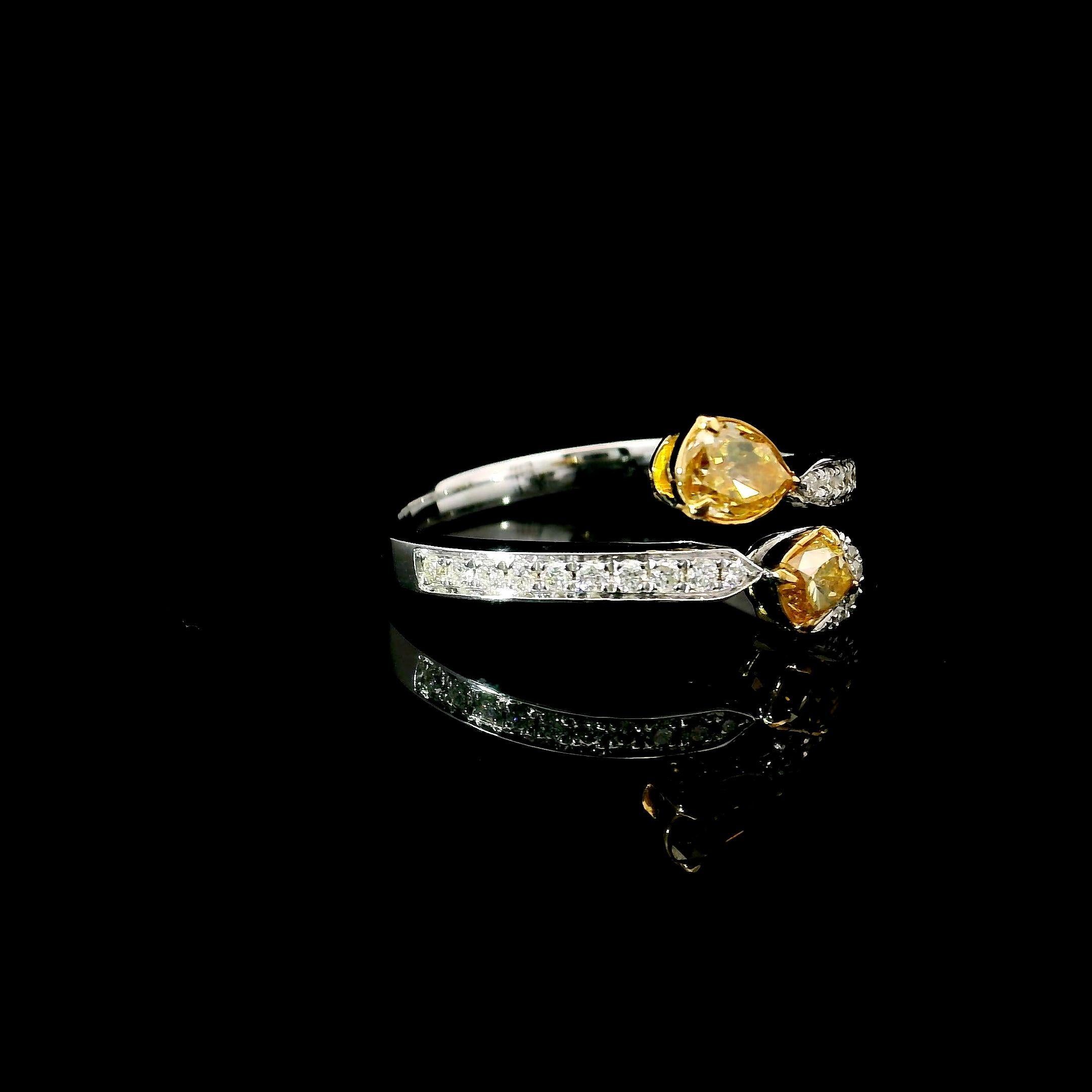 Pear Cut AGL Certified 0.324 / 0.226 Carat Fancy Intense Yellow VS Clarity Diamond Ring For Sale