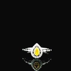 AGL Certified 0.324 Carat Fancy Vivid Yellow VS Clarity Diamond Ring