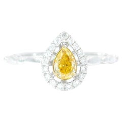AGL Certified 0.324 Carat Fancy Vivid Yellow VS Clarity Diamond Ring