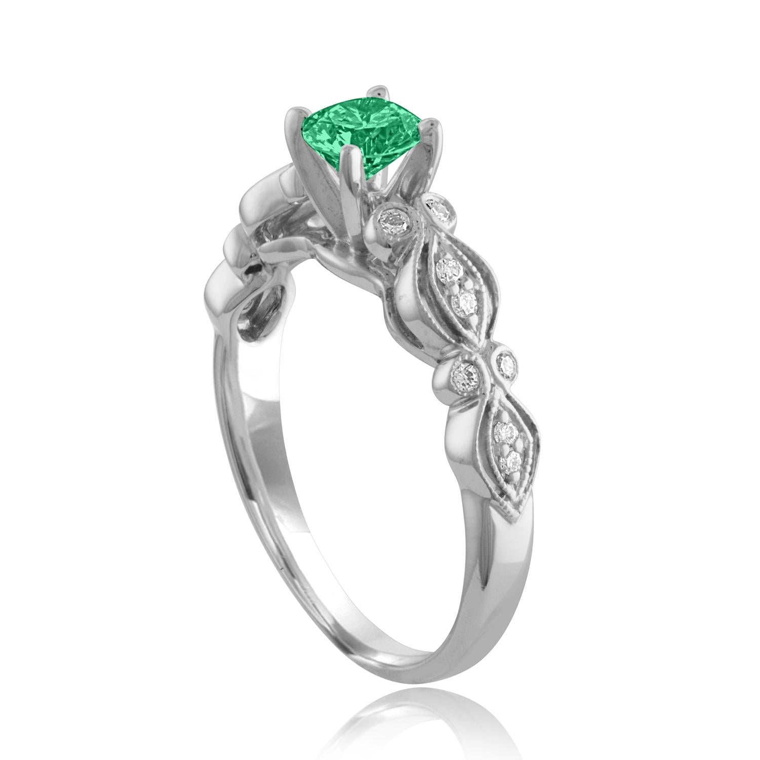 Beautiful Diamond & Emerald Milgrain Ring
The ring is 18K White Gold.
There are 0.13 Carats in Diamonds F/G VS/SI
The Center is Round 0.35 Carat Emerald.
The Emerald is AGL certified.
The ring is a size 6.75, sizable.
The ring weighs 3.6 grams.