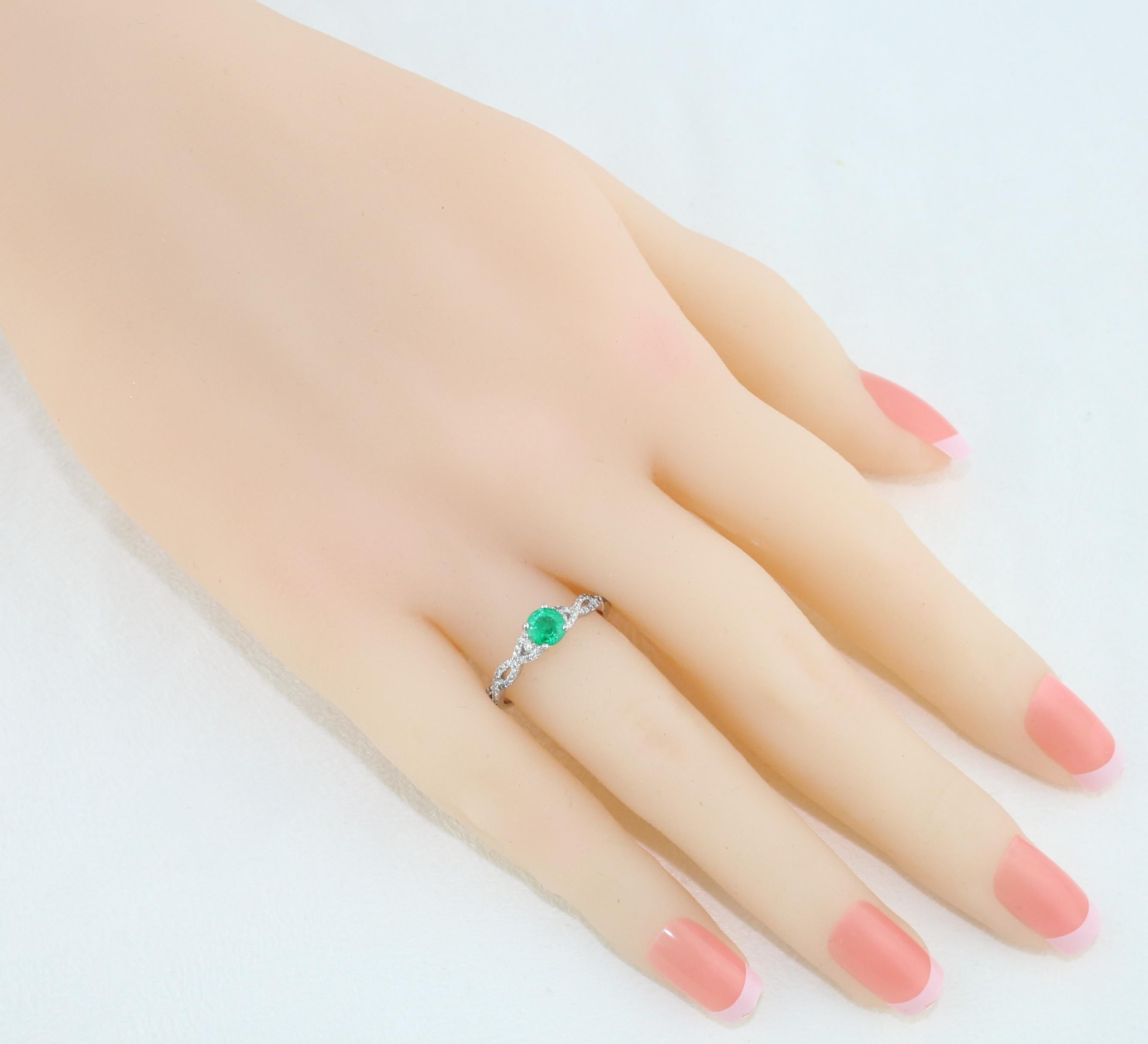 infinity emerald ring
