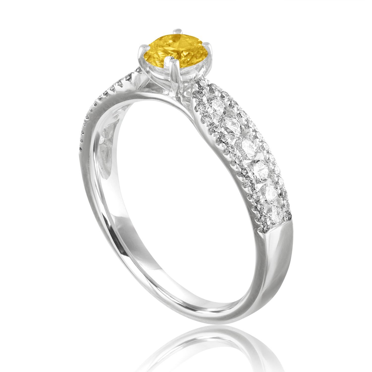 Schöner Saphir Ring
Der Ring ist aus 18K Weißgold
Der Mittelstein ist ein runder gelber Saphir 0,42 Karat
Der Sapphire ist AGL-zertifiziert beheizt
Es sind 0.51 Karat in Diamanten F/G VS/SI
Der Ring ist eine Größe 6.50, sizable.
Der Ring wiegt 2.6