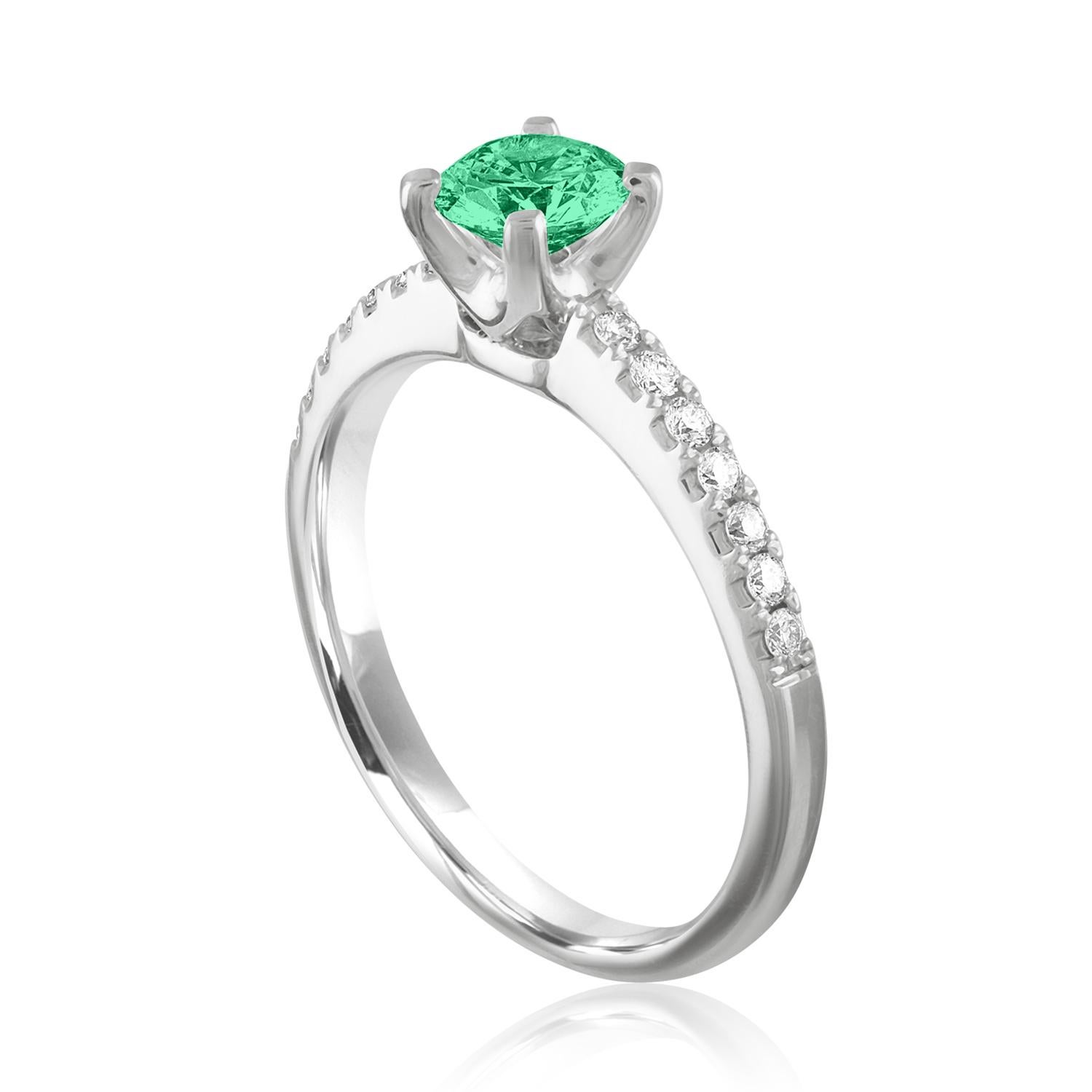 Beautiful Diamond & Emerald Ring
The ring is 18K White Gold.
There are 0.19 Carats in Diamonds F/G VS/SI
The Center is Round 0.46 Carat Emerald.
The Emerald is AGL certified.
The ring is a size 6.25, sizable.
The ring weighs 3.2 grams.