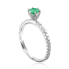 Anello in oro con diamante smeraldo certificato AGL da 0.46 carati