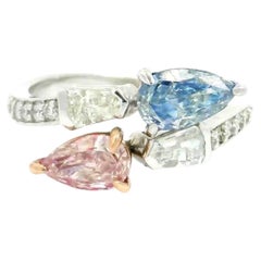 AGL-zertifizierter Diamantring mit 0,60 / 0,74 Karat, Farbe „Fancy Blue“ / „Fancy Pink“, Reinheit „VS“