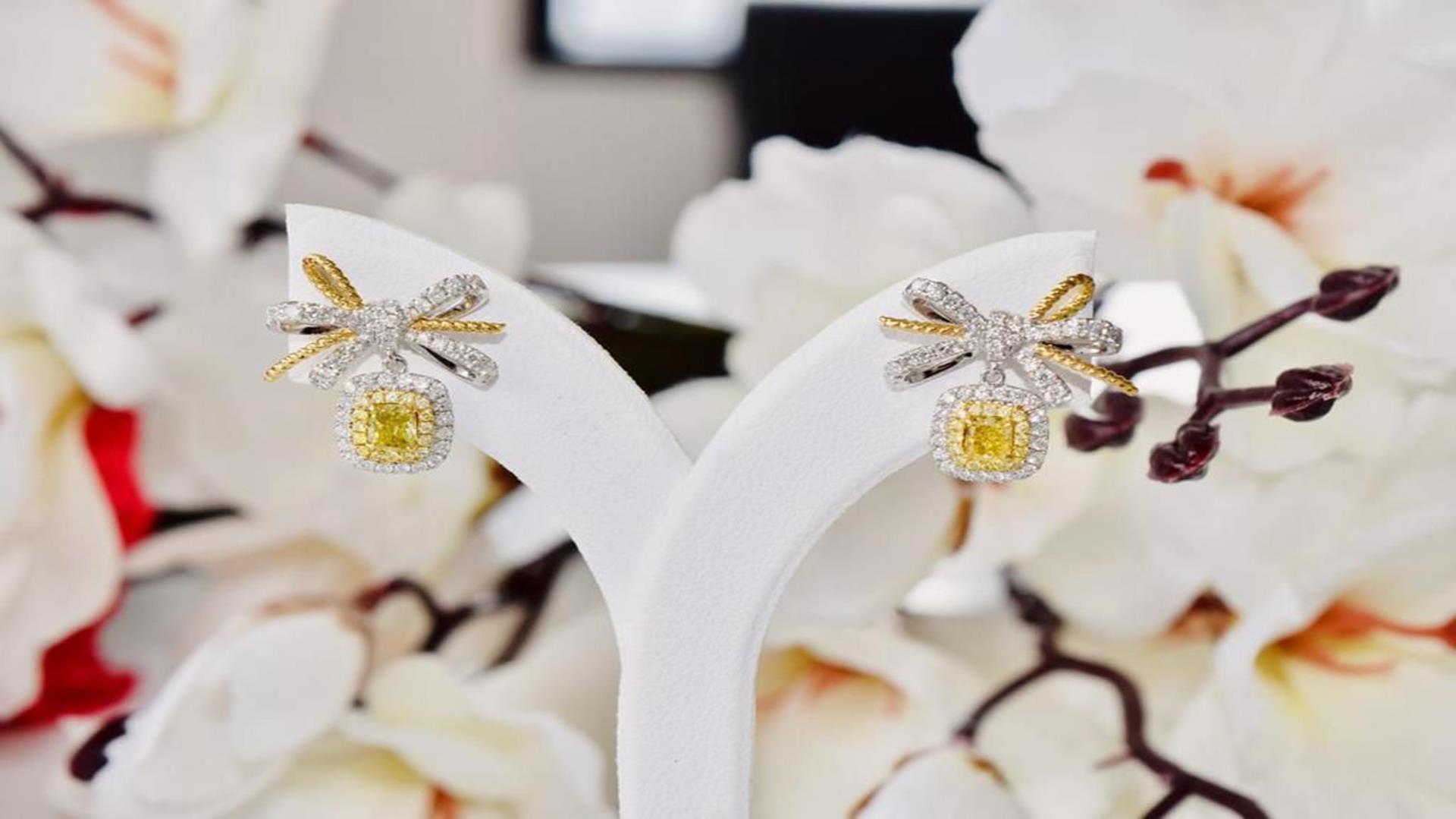 AGL Certified 0.752 Carat Fancy Yellow SI Clarity Diamond Earrings In New Condition For Sale In บางรัก, TH