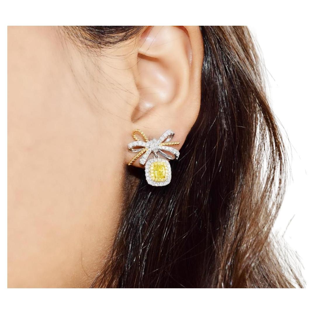 AGL Certified 0.752 Carat Fancy Yellow SI Clarity Diamond Earrings