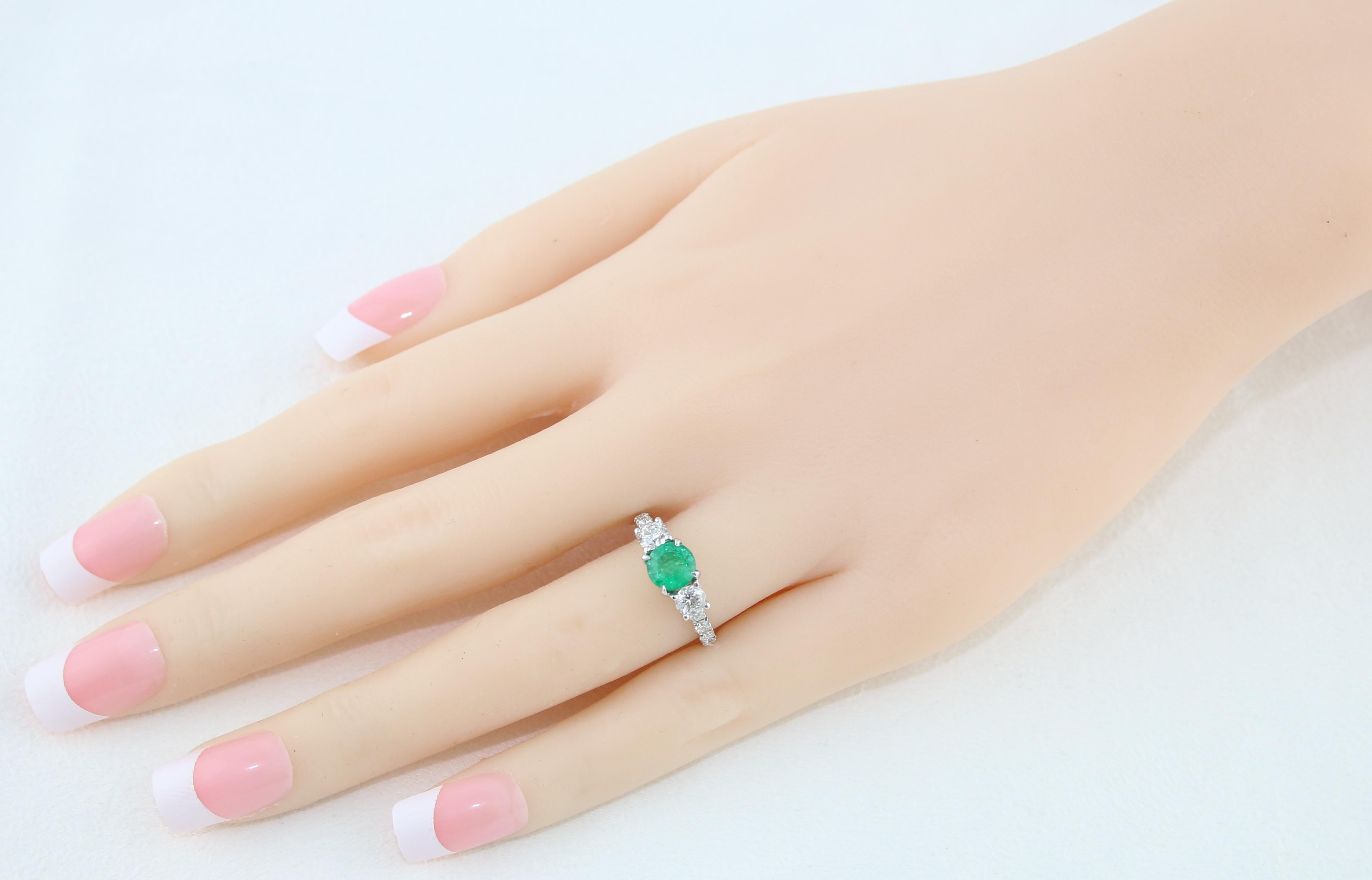 Women's AGL Certified 0.77 Carat Emerald Three-Stone Diamond Gold Ring For Sale