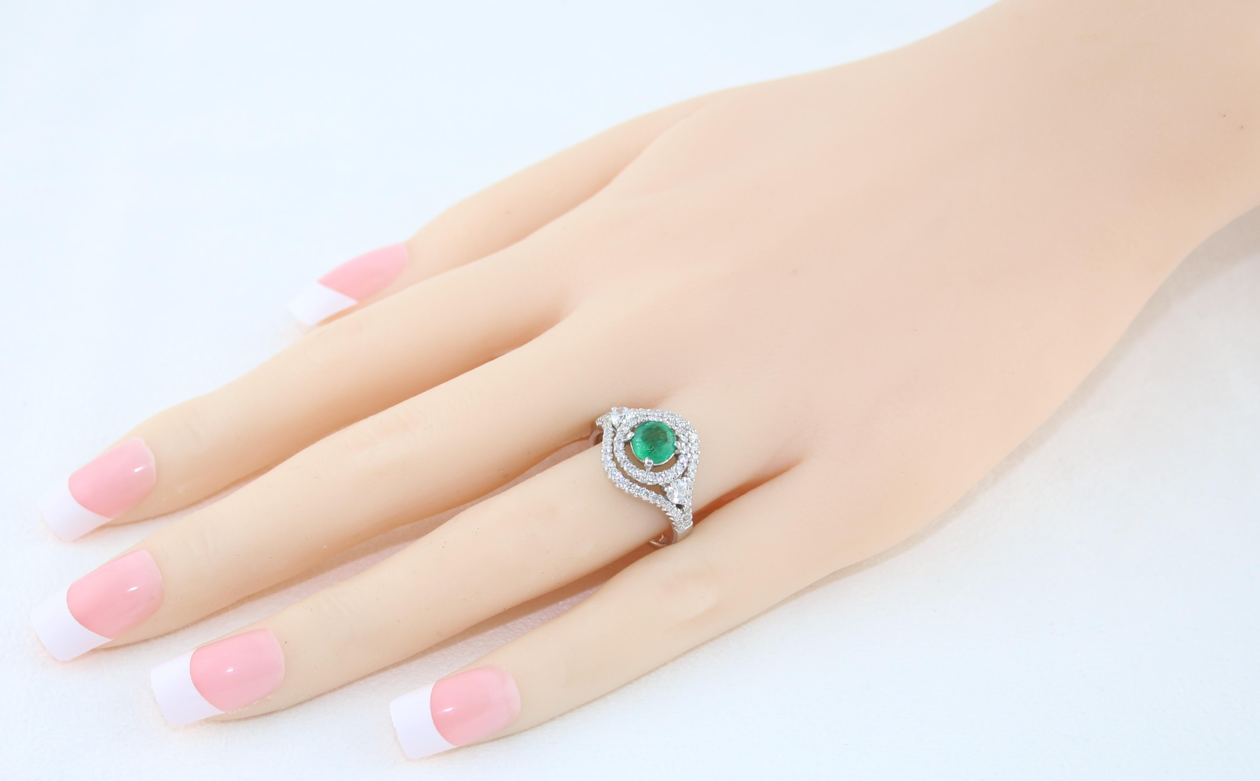 Contemporary AGL Certified 0.78 Carat Round Emerald Diamond Gold Ring For Sale