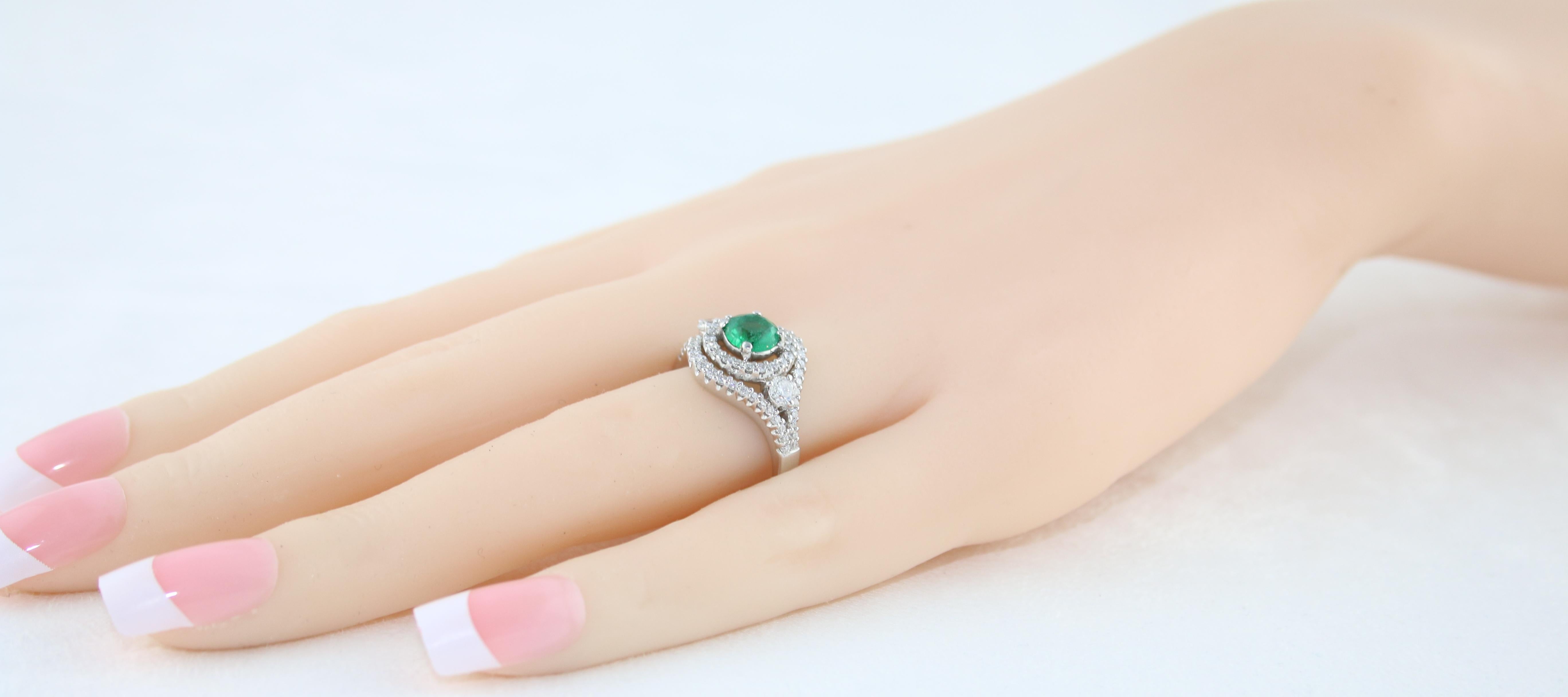 Women's AGL Certified 0.78 Carat Round Emerald Diamond Gold Ring For Sale